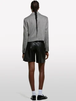 Blazer cropped con frange