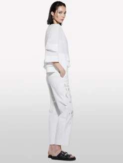 Blusa bianca con balze